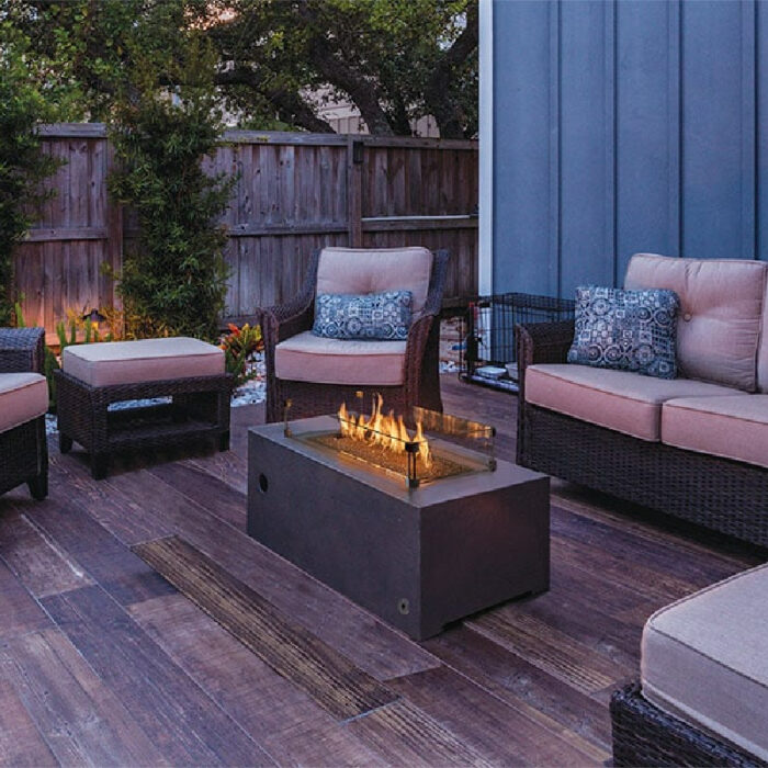 Beautiful backyard firepit at dusk with comfortable chairs